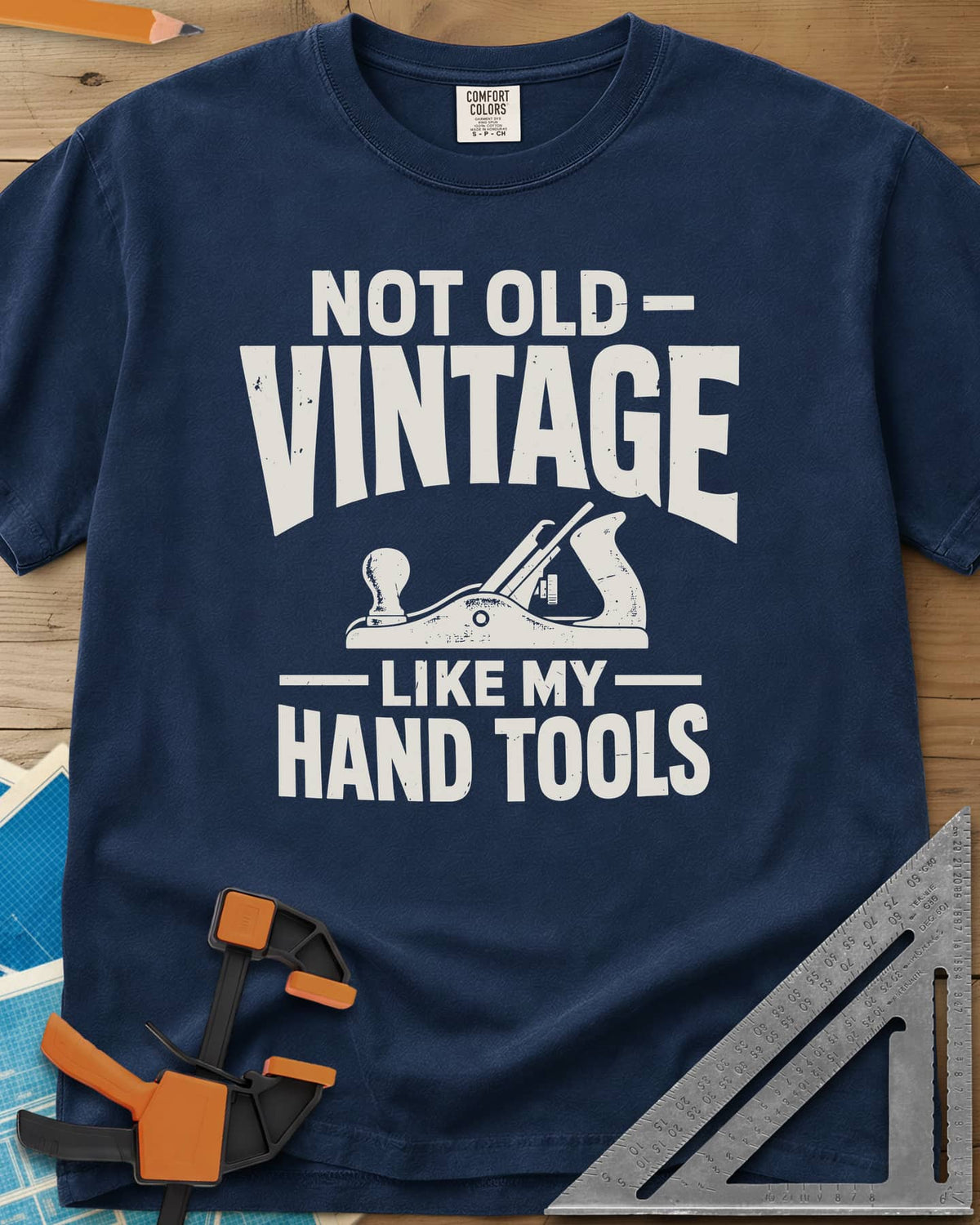 Vintage Tools heavyweight tee in Navy, a small bench plane between worn block lettering