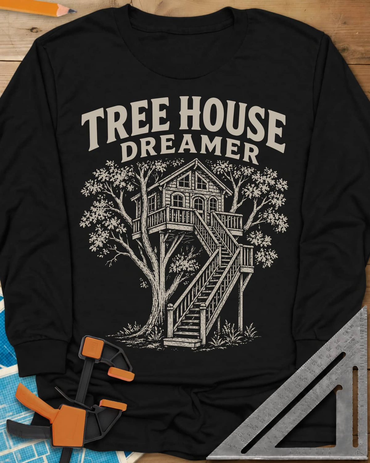 Vintage Tree House Dreamer long sleeve shirt in Black, engraved-style treehouse with a railed deck and wide stairs