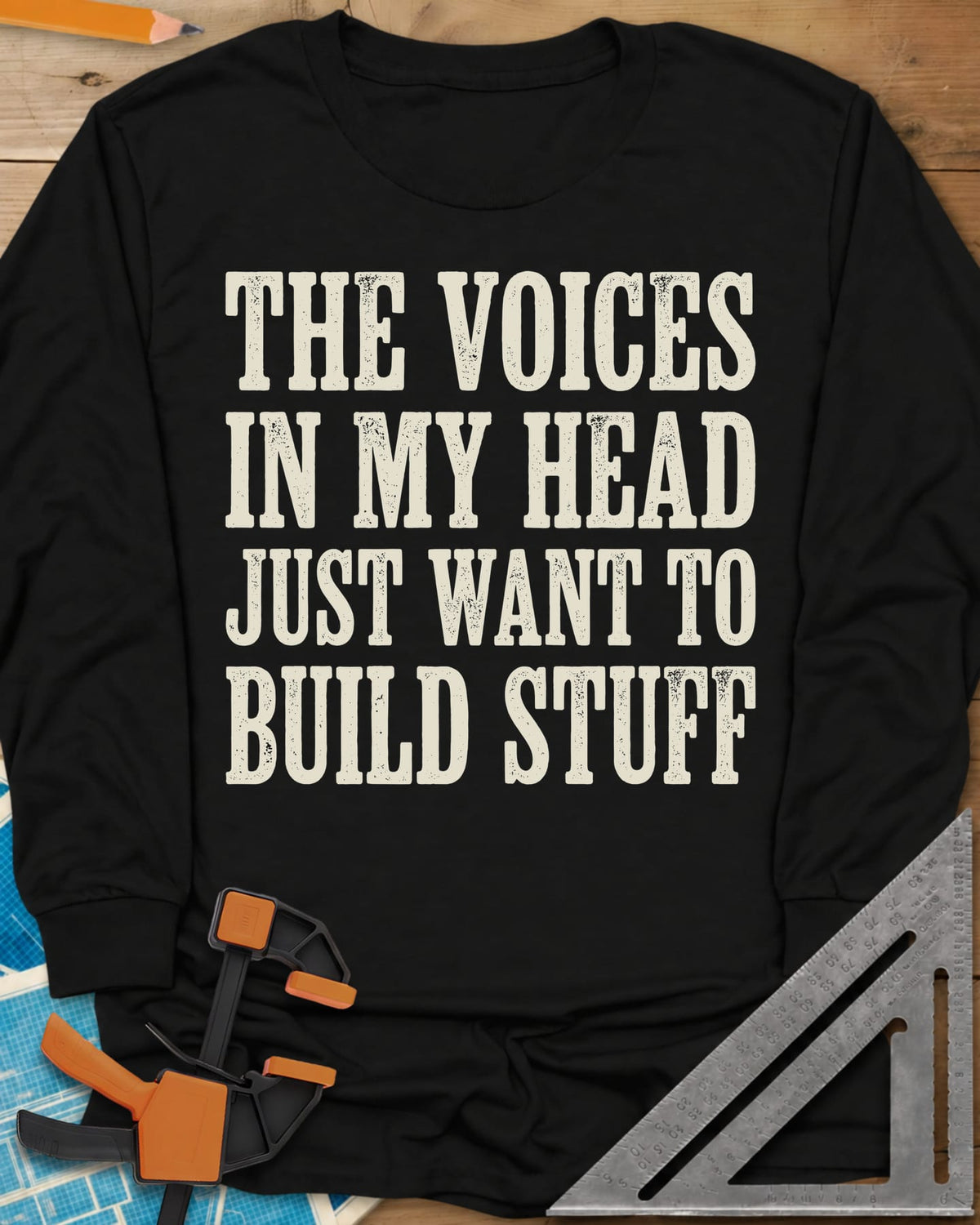 Voices In My Head Woodworker long sleeve shirt in Black, four lines of big worn slab-serif letters, no graphic