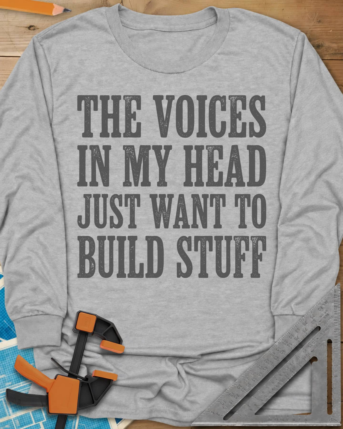 Voices In My Head Woodworker long sleeve shirt in Sport Grey, four lines of big worn slab-serif letters, no graphic