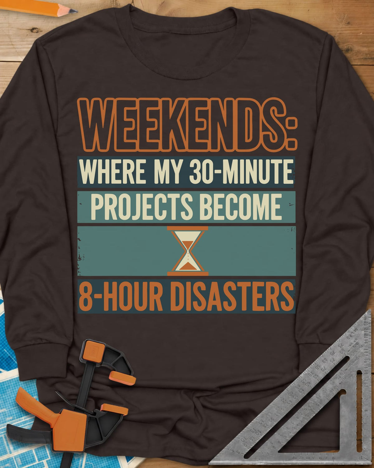 Weekend Disasters long sleeve shirt in Dark Chocolate, retro striped text blocks around an hourglass