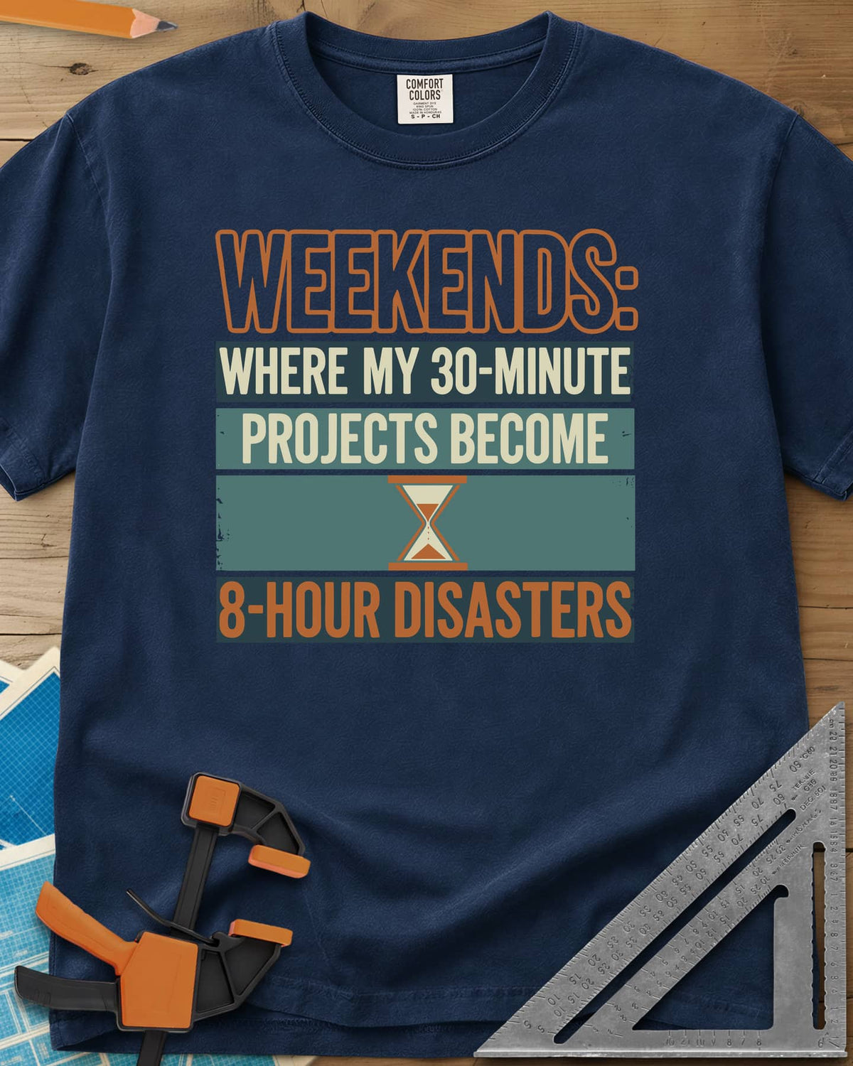 Weekend Disasters heavyweight tee in Navy, retro striped text blocks around an hourglass