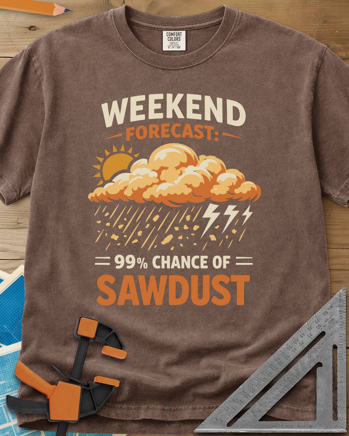 Weekend Forecast heavyweight tee in Espresso, a sun behind a cloud raining wood chips and lightning