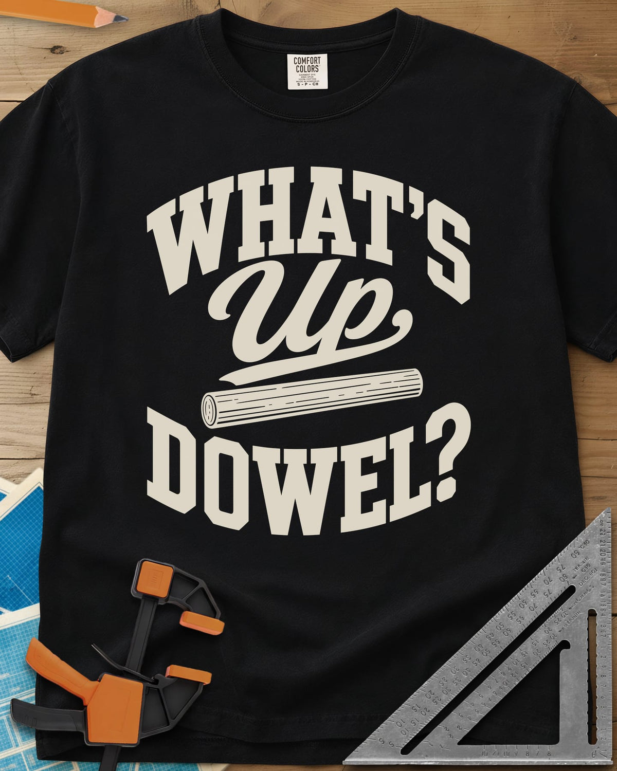 What'S Up Dowel heavyweight tee in Black, a wooden dowel under a script Up between slab-style words