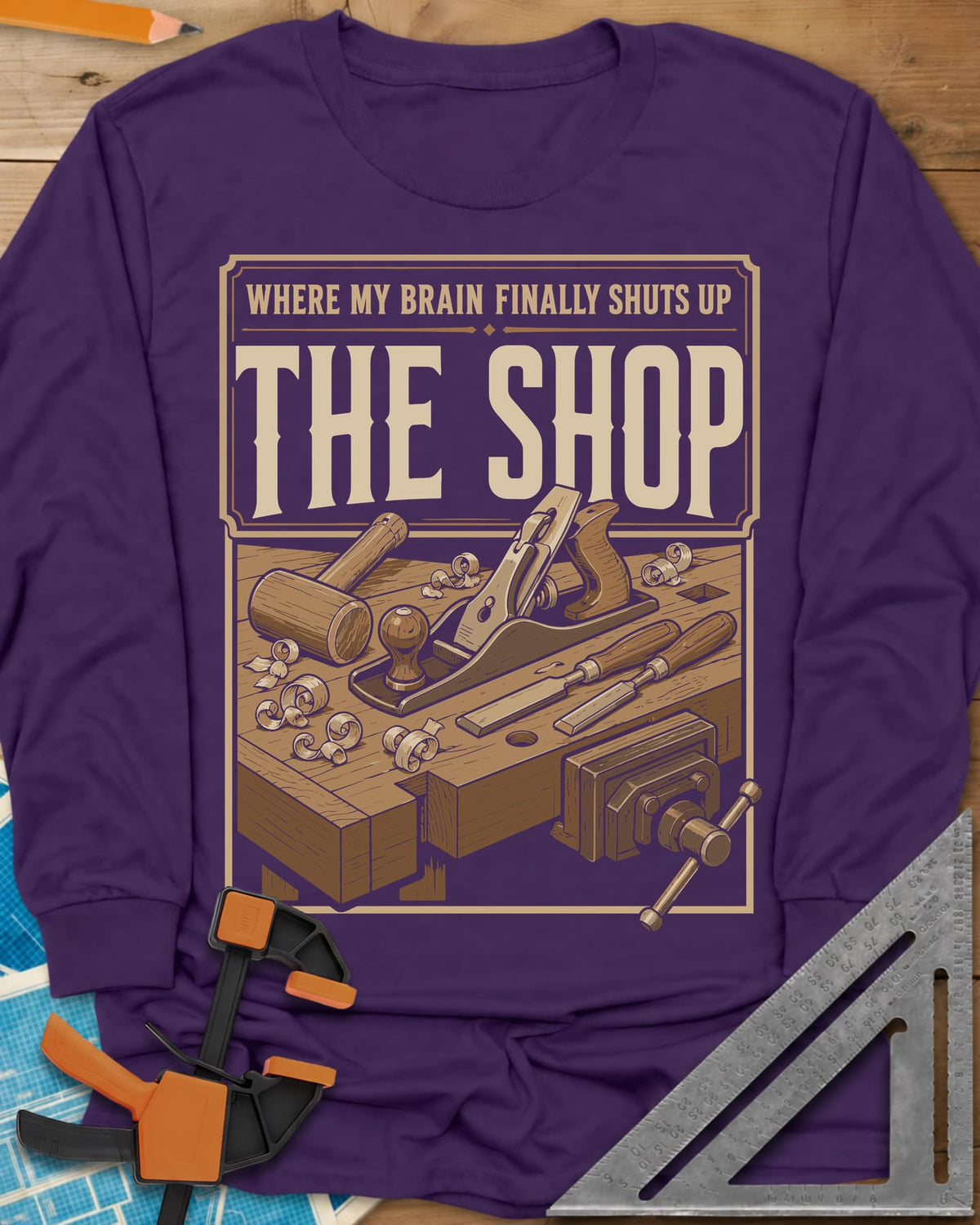 Where My Brain Finally Shuts Up long sleeve shirt in Purple, a framed workbench poster with plane, mallet, chisels and vise
