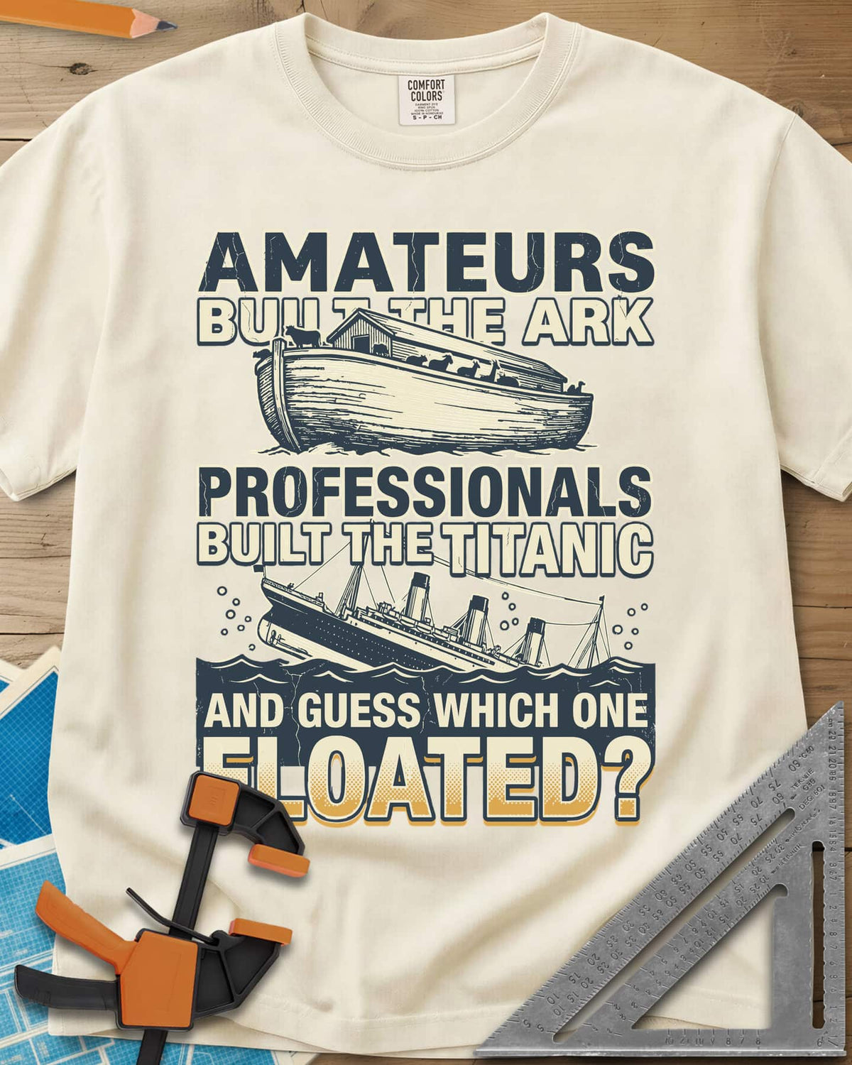 Which One Floated heavyweight tee in Ivory, a wooden ark and a sinking ocean liner between lines of text