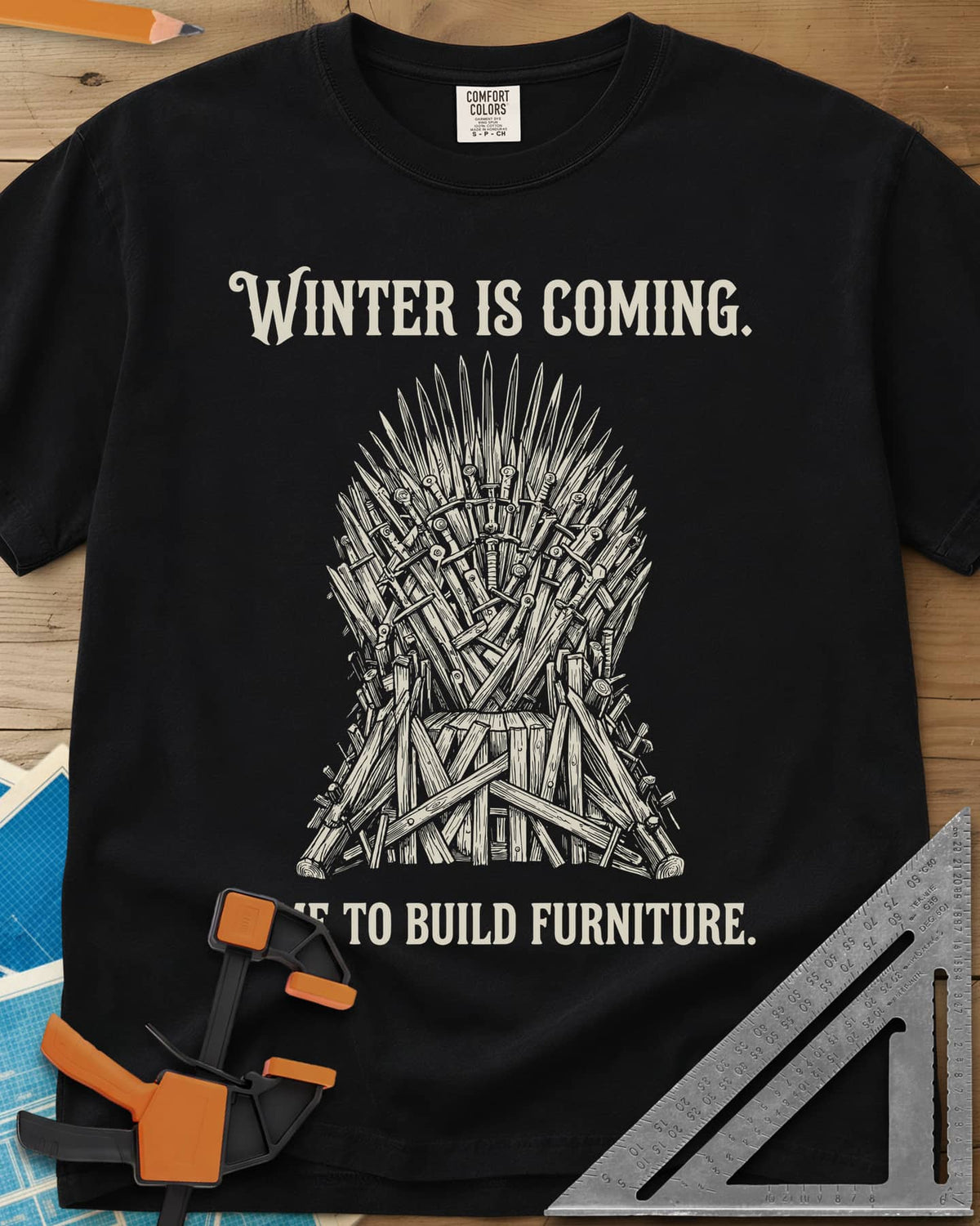 Winter Is Coming Time To Build Furniture heavyweight tee in Black, a spiky throne of blades and rough planks between two