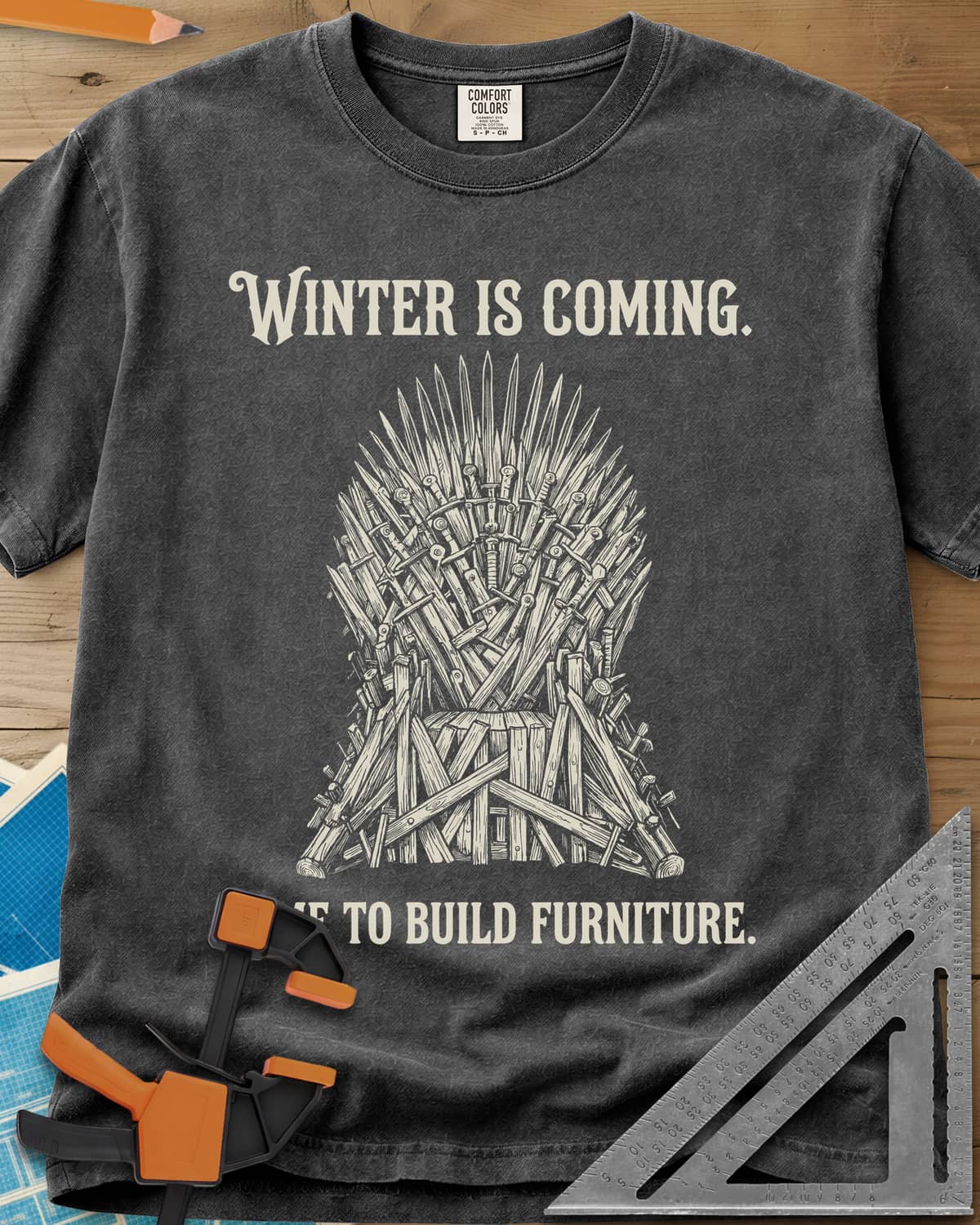 Winter Is Coming Time To Build Furniture heavyweight tee in Pepper, a spiky throne of blades and rough planks between two