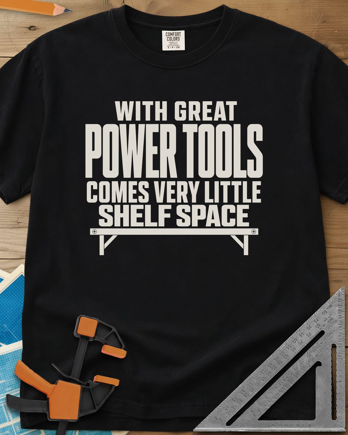 With Great Power Tools heavyweight tee in Black, a bare wall shelf with brackets and screws under the slogan