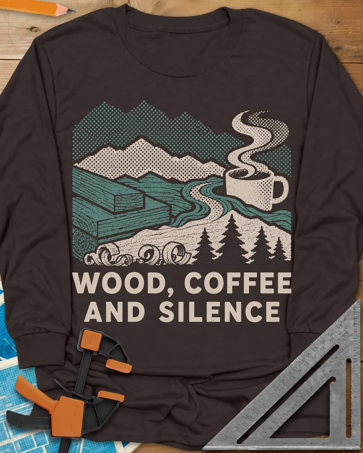 Wood Coffee Silence long sleeve shirt in Dark Chocolate, mountains, stacked lumber, pines and a steaming coffee cup