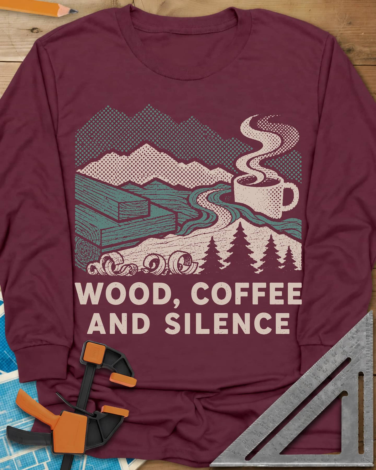 Wood Coffee Silence long sleeve shirt in Maroon, mountains, stacked lumber, pines and a steaming coffee cup