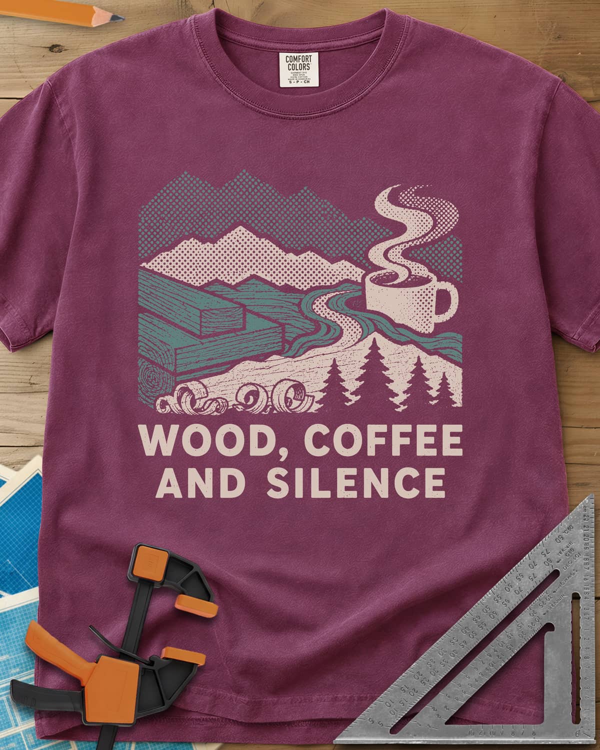 Wood Coffee Silence heavyweight tee in Berry, mountains, stacked lumber, pines and a steaming coffee cup