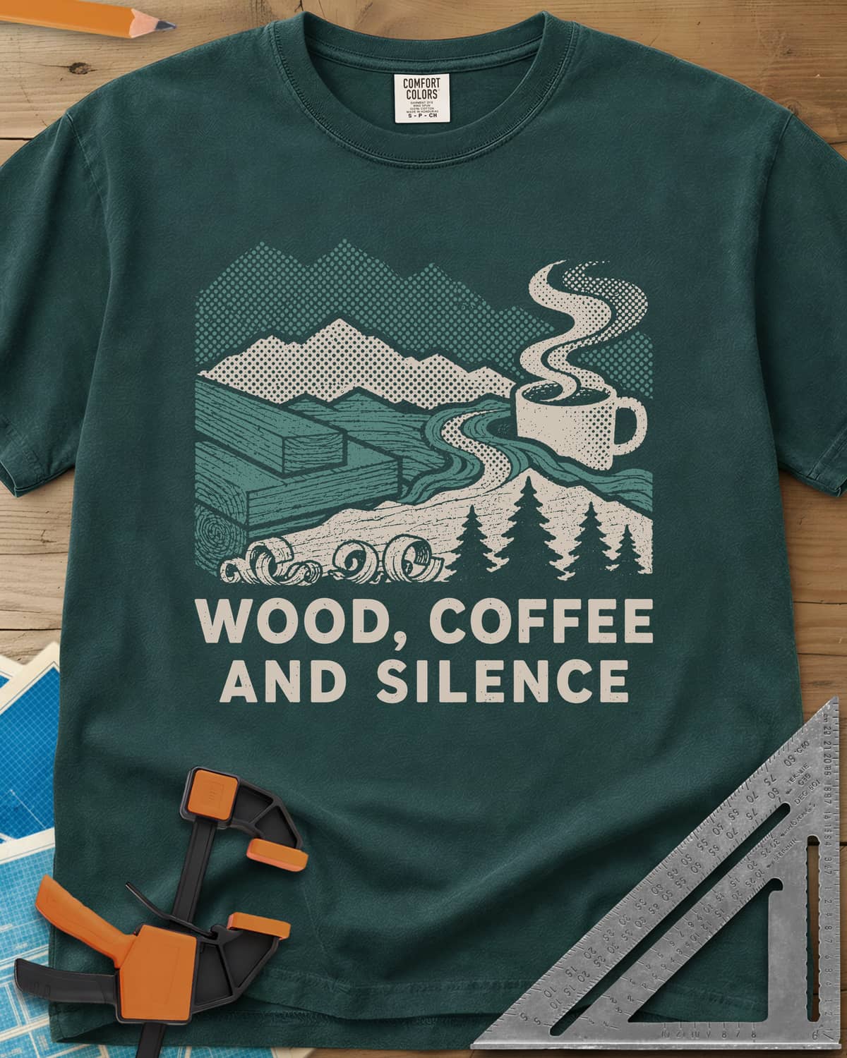 Wood Coffee Silence heavyweight tee in Blue Spruce, mountains, stacked lumber, pines and a steaming coffee cup