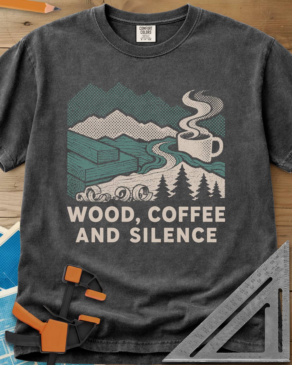 Wood Coffee Silence heavyweight tee in Pepper, mountains, stacked lumber, pines and a steaming coffee cup