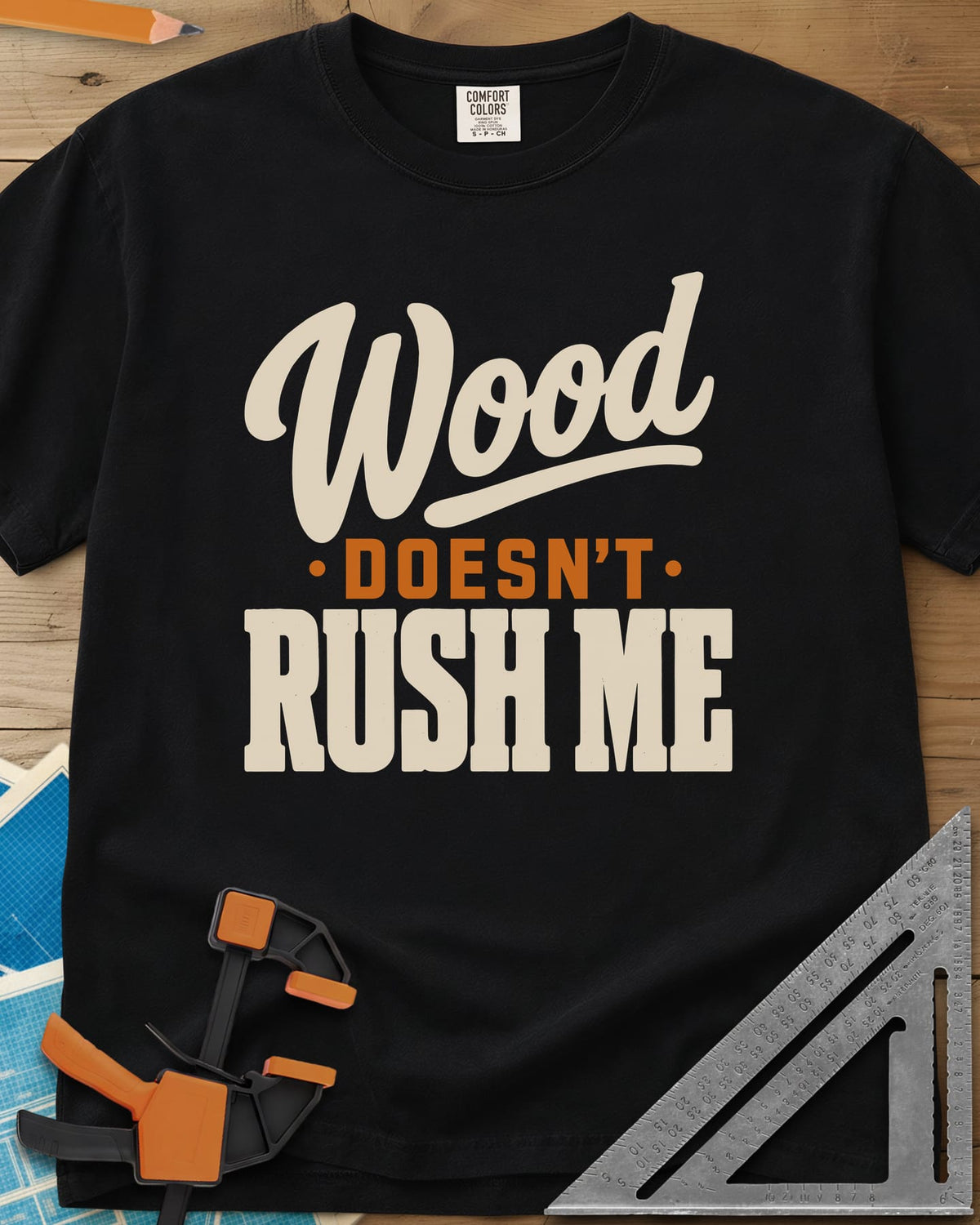 Wood Doesn'T Rush heavyweight tee in Black, script and block lettering in cream and gold, no graphics