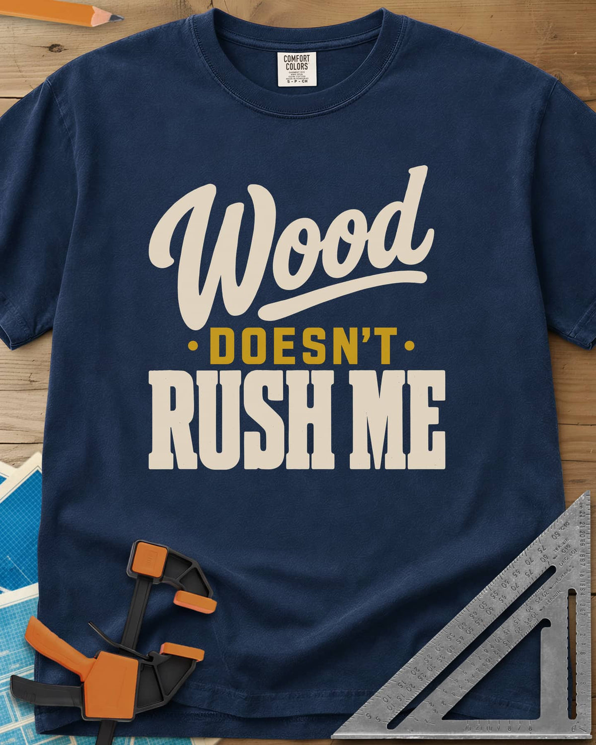 Wood Doesn'T Rush heavyweight tee in Navy, script and block lettering in cream and gold, no graphics