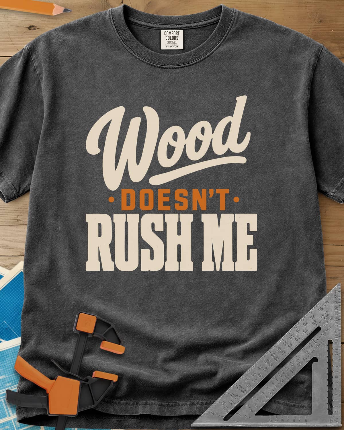 Wood Doesn'T Rush heavyweight tee in Pepper, script and block lettering in cream and gold, no graphics
