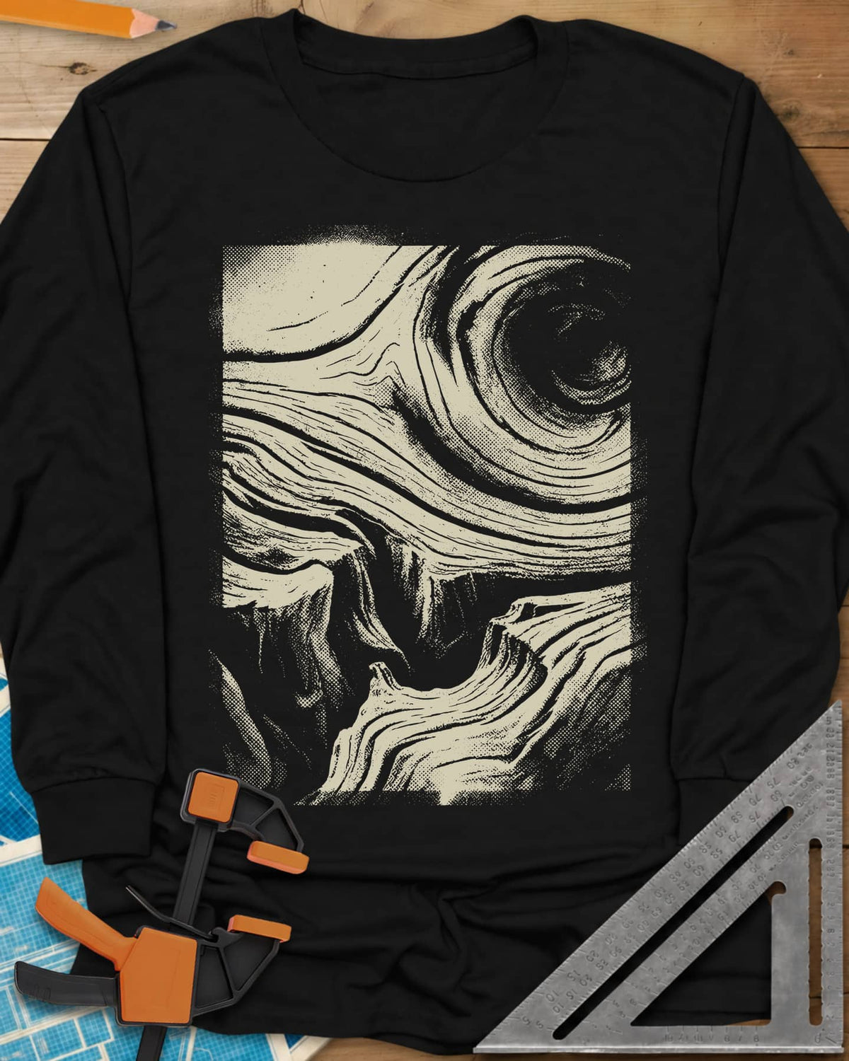 Wood Grain Skull long sleeve shirt in Black, a skull hiding in swirling halftone wood grain