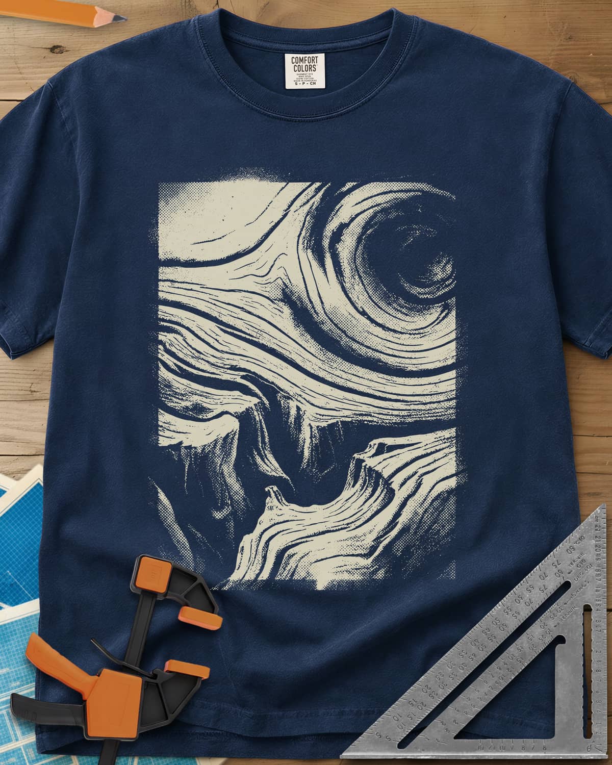Wood Grain Skull heavyweight tee in Navy, a skull hiding in swirling halftone wood grain
