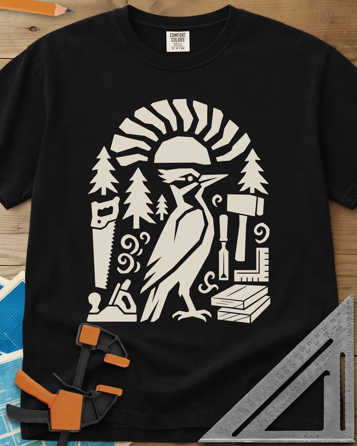 Woodpecker Craft heavyweight tee in Black, a geometric woodpecker among saws, planes, chisels and pine trees