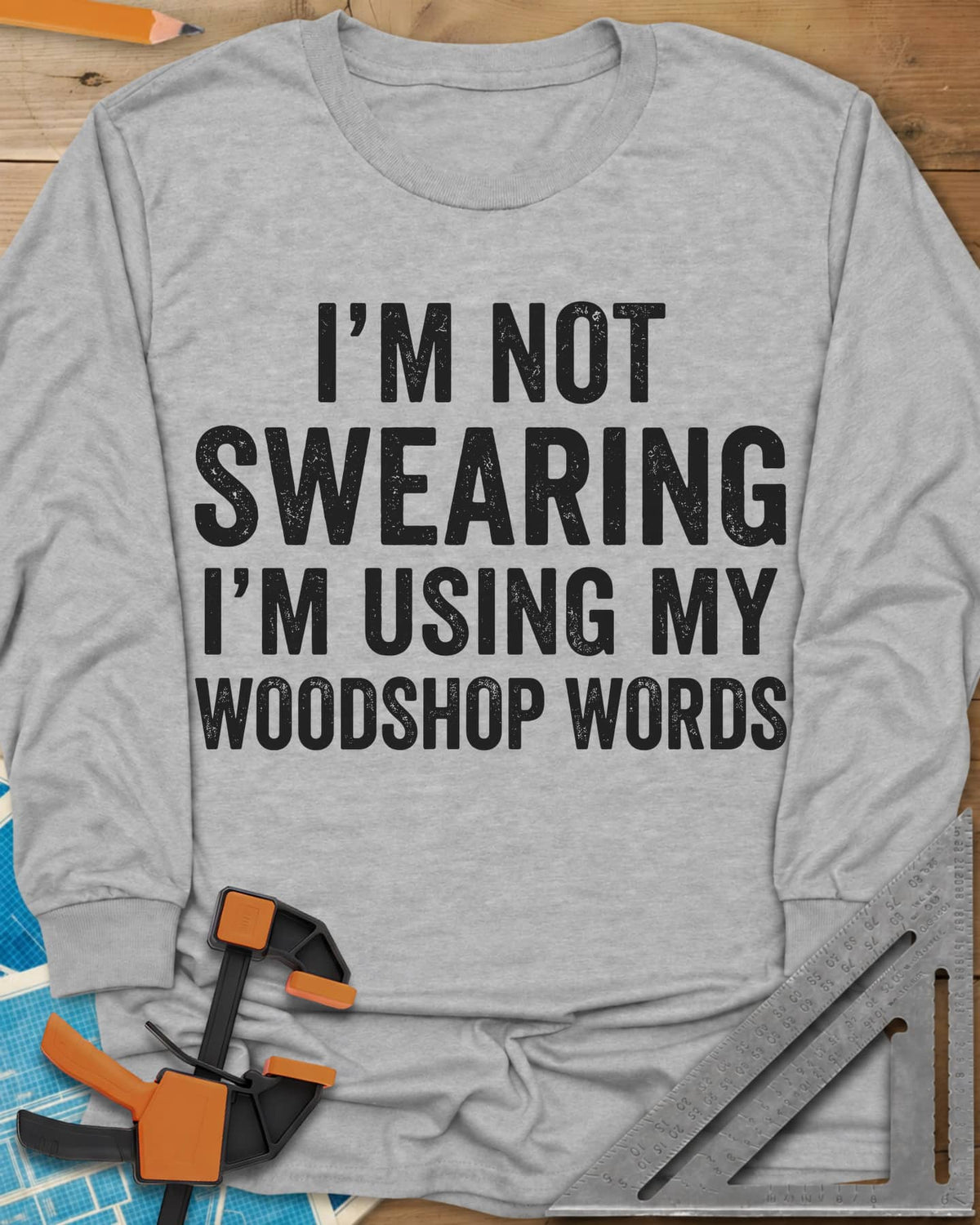 Woodshop Words long sleeve shirt in Sport Grey, distressed all-caps lettering, no graphics