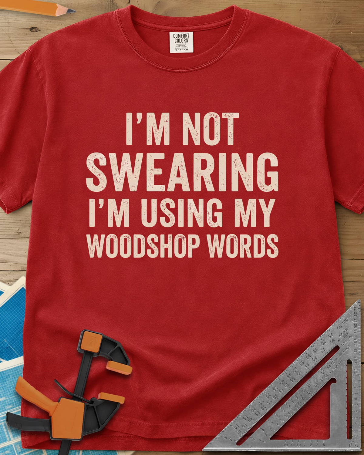 Woodshop Words heavyweight tee in Red, distressed all-caps lettering, no graphics