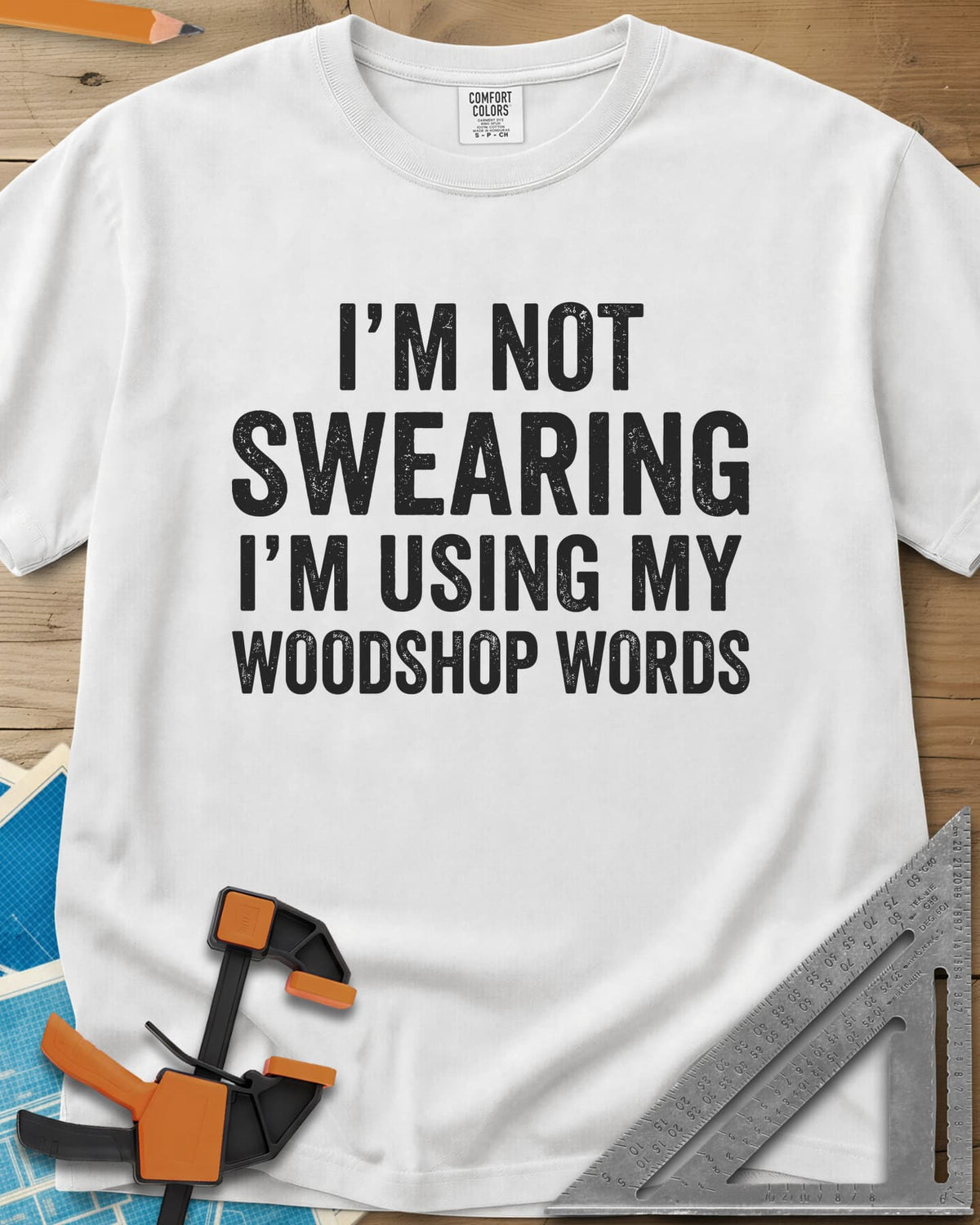 Woodshop Words heavyweight tee in White, distressed all-caps lettering, no graphics