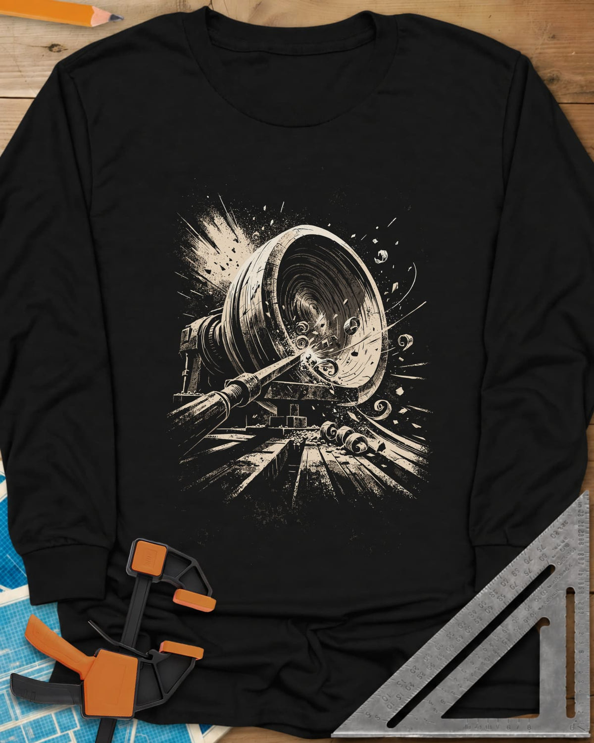 Woodturning Fury long sleeve shirt in Black, a wood lathe mid-cut with shavings and chips flying