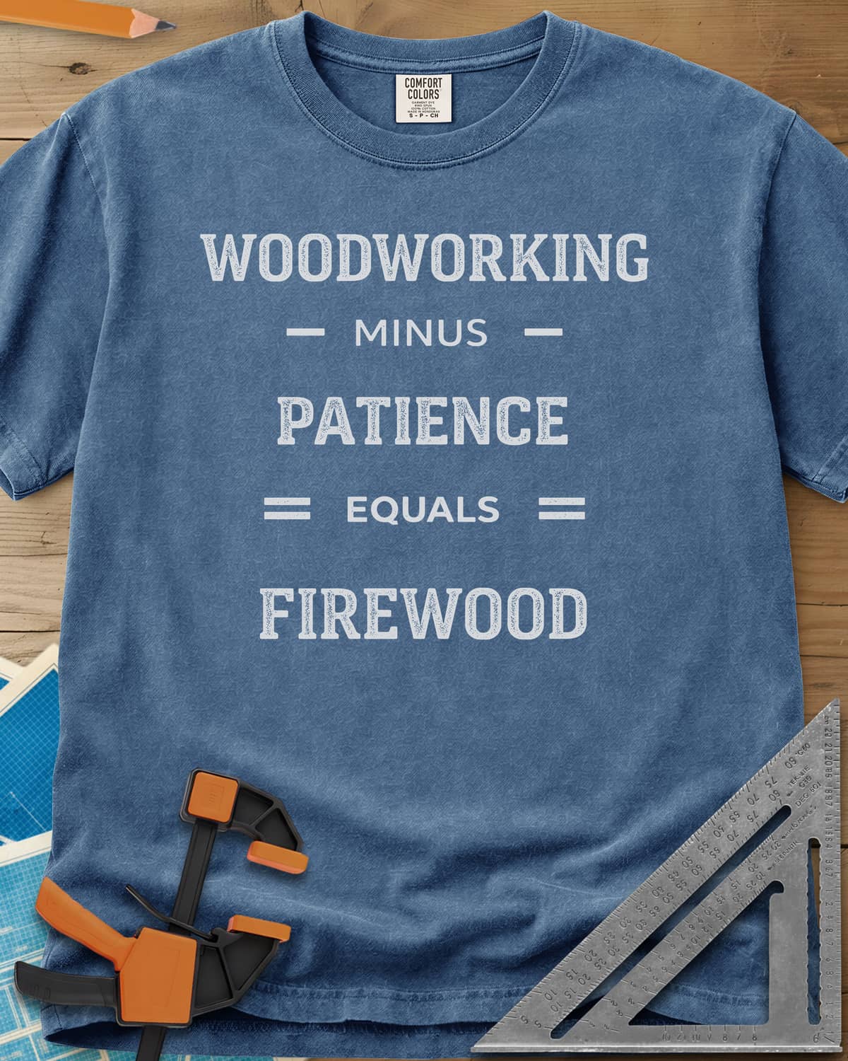 Woodwork Minus Patience heavyweight tee in Blue Jean, varsity lettering set out as a minus-and-equals sum