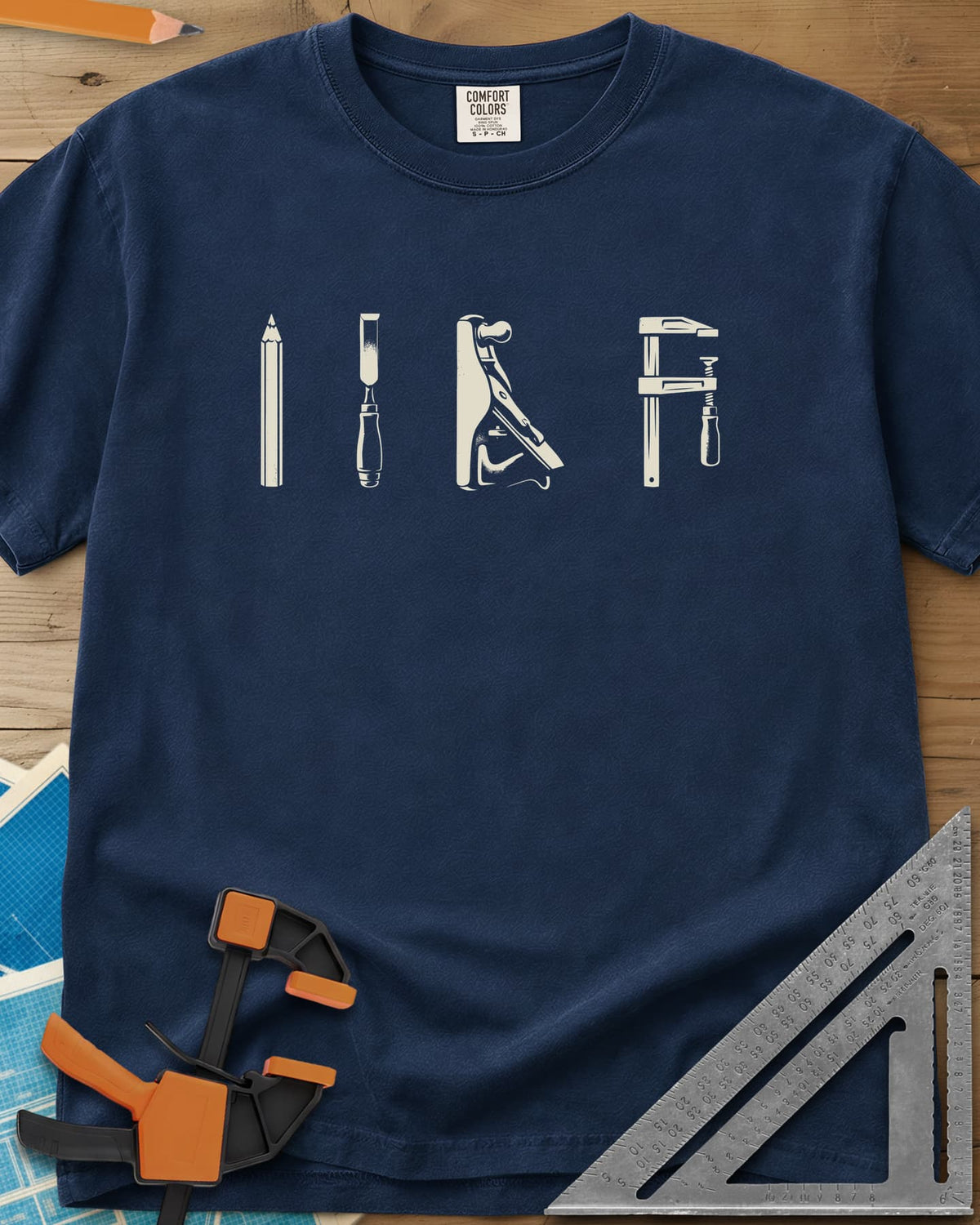 Woodworker Arsenal heavyweight tee in Navy, four tools in a row: pencil, chisel, hand plane, bar clamp