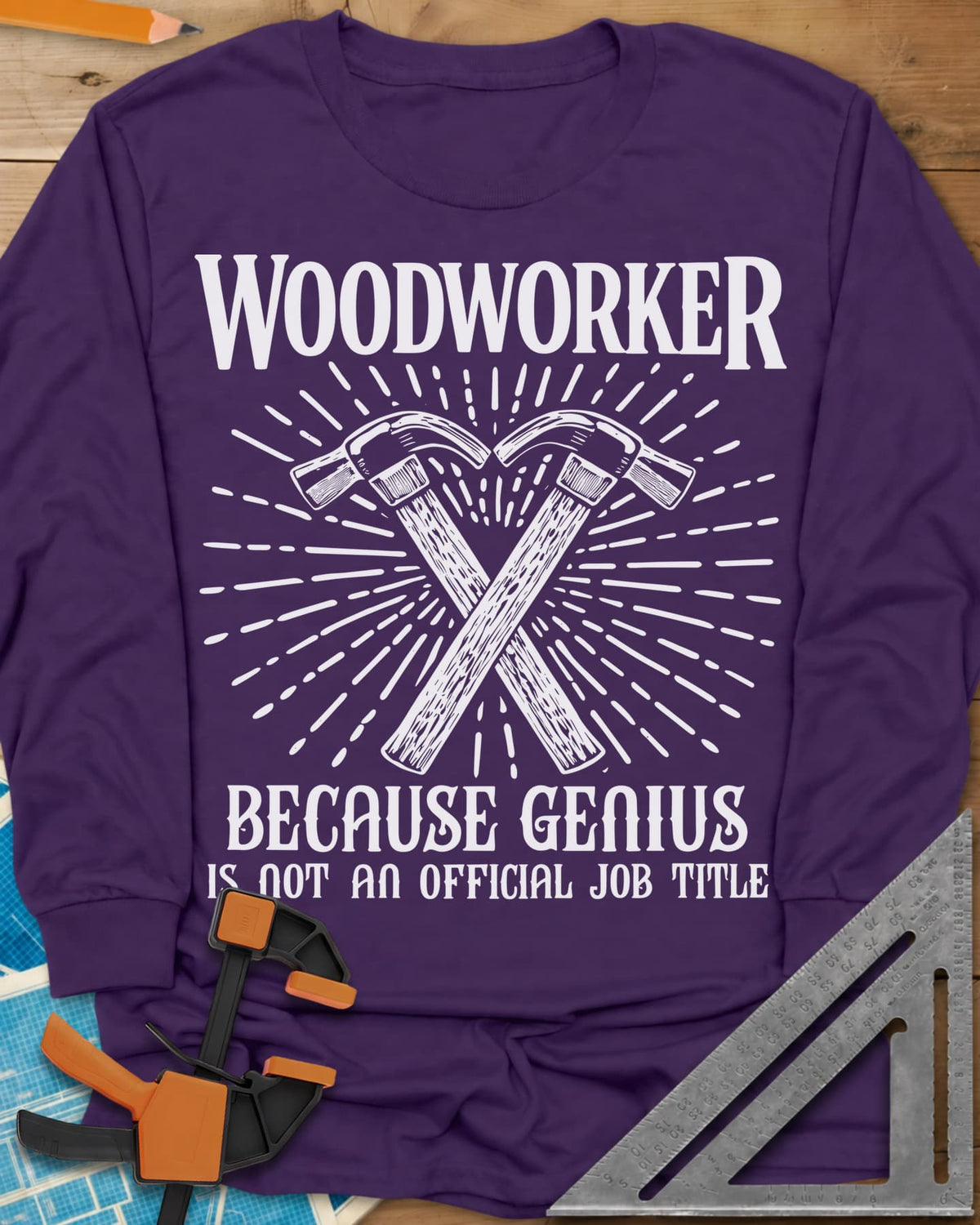 Woodworker Because Genius long sleeve shirt in Purple, two crossed hammers inside a sunburst of fine lines