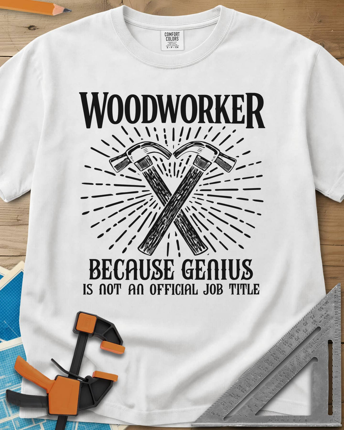 Woodworker Because Genius heavyweight tee in White, two crossed hammers inside a sunburst of fine lines