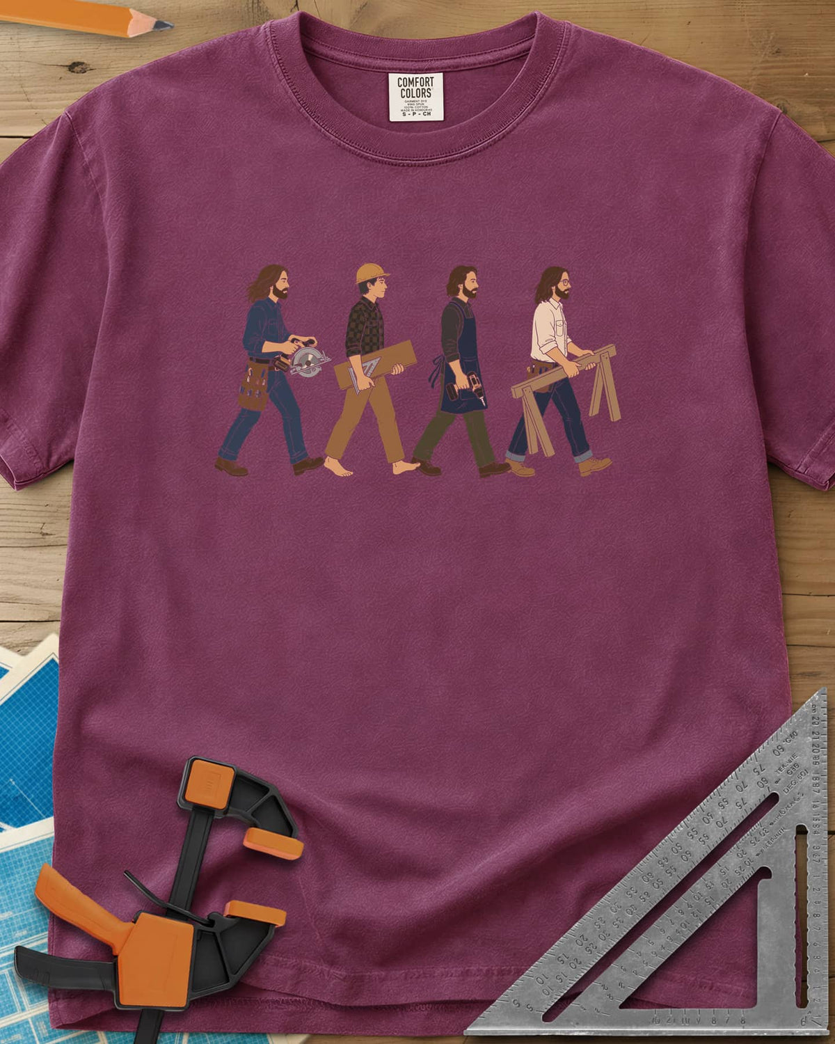 Woodworker Crossing heavyweight tee in Berry, four woodworkers walking in single file with tools