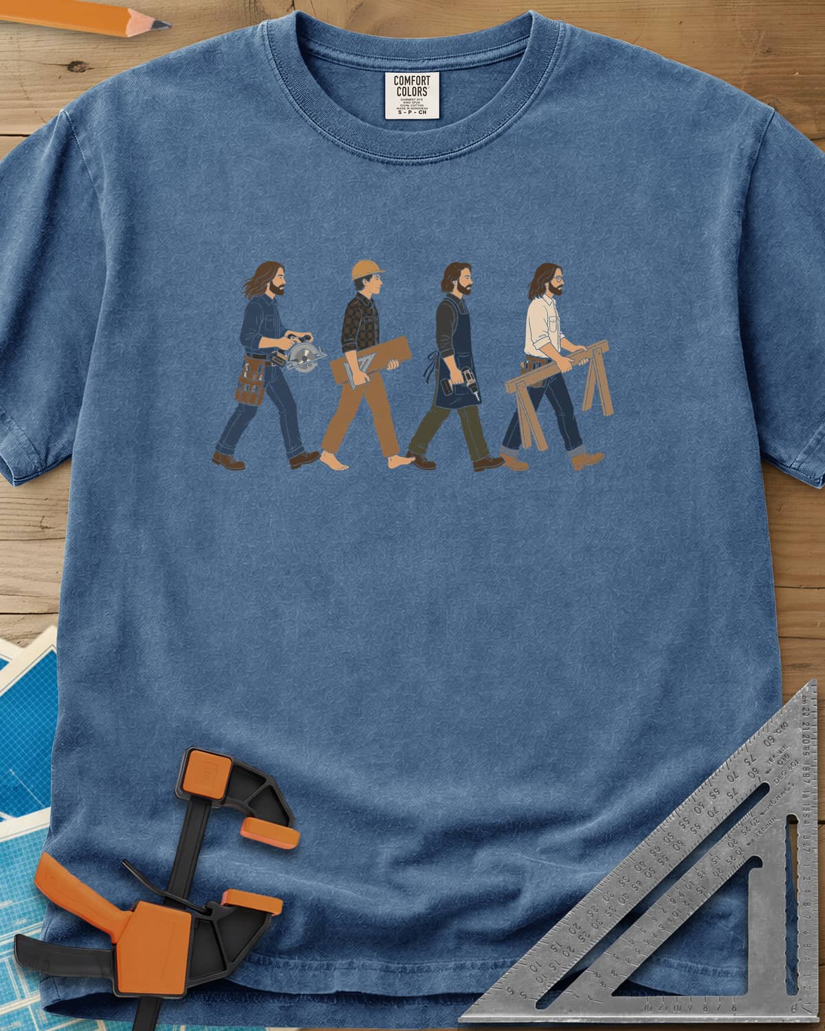 Woodworker Crossing heavyweight tee in Blue Jean, four woodworkers walking in single file with tools