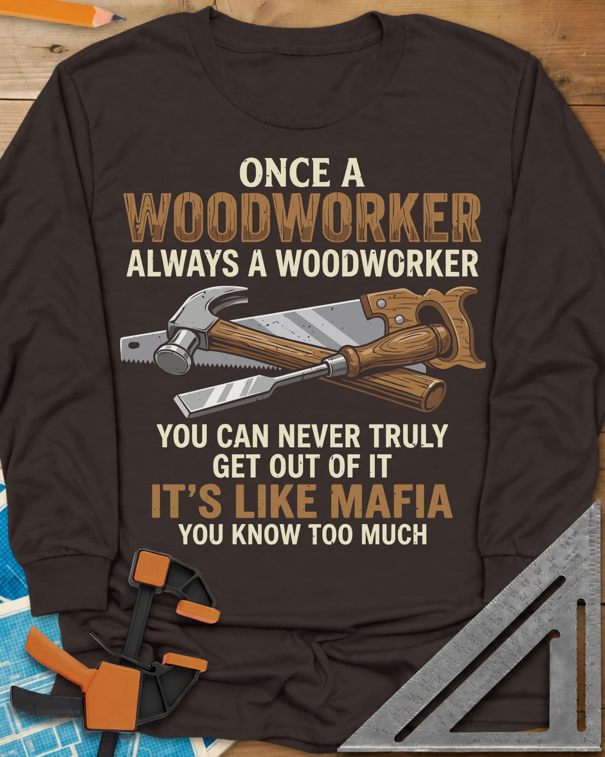 Woodworker For Life long sleeve shirt in Dark Chocolate, a claw hammer, hand saw and chisel crossed in the middle