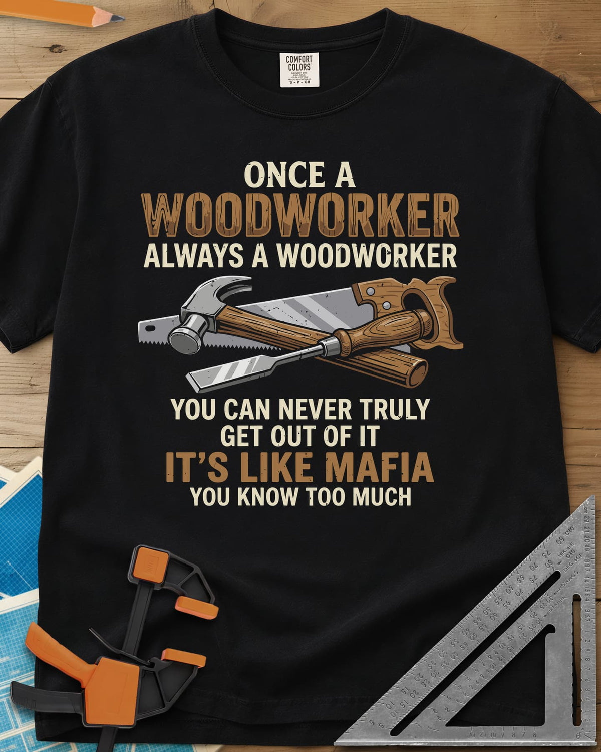 Woodworker For Life heavyweight tee in Black, a claw hammer, hand saw and chisel crossed in the middle