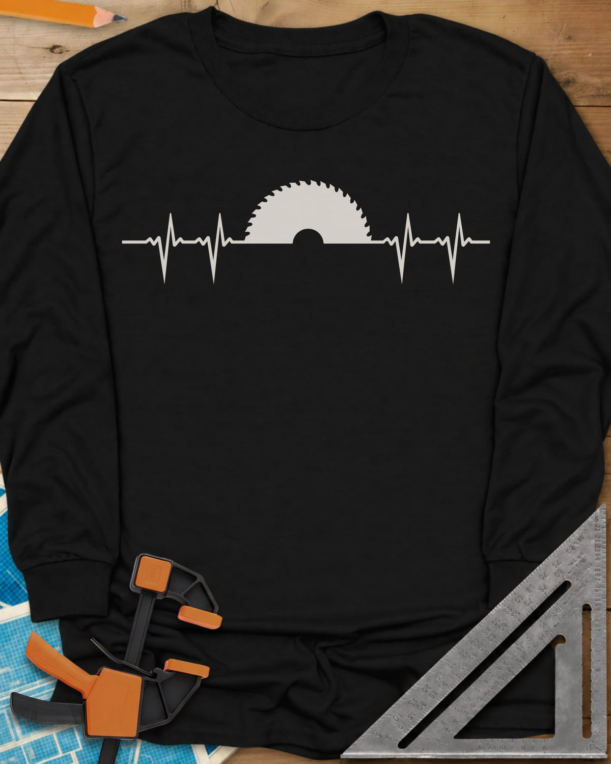 Woodworker Heartbeat long sleeve shirt in Black, a heartbeat line rising into a half saw blade