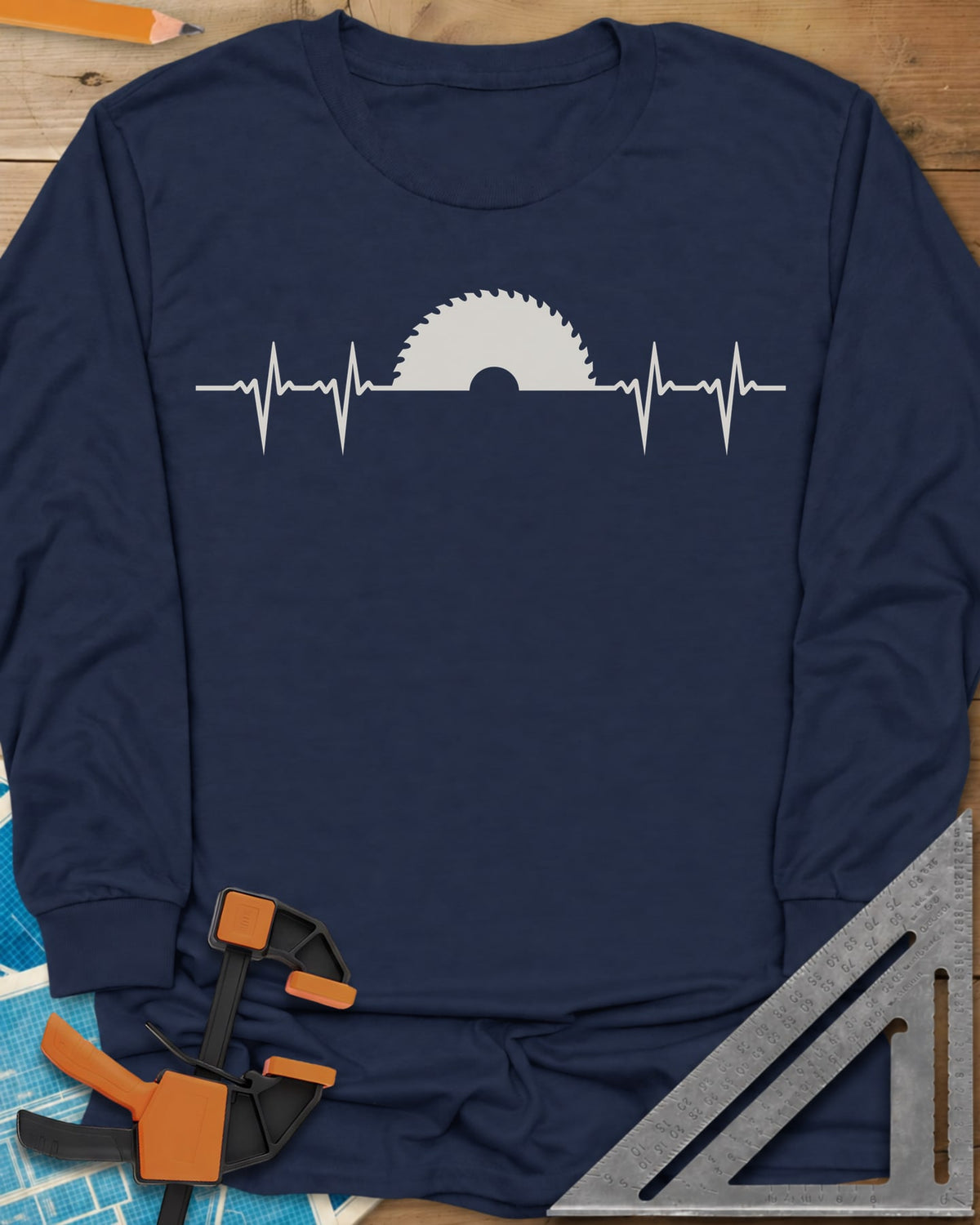 Woodworker Heartbeat long sleeve shirt in Navy, a heartbeat line rising into a half saw blade