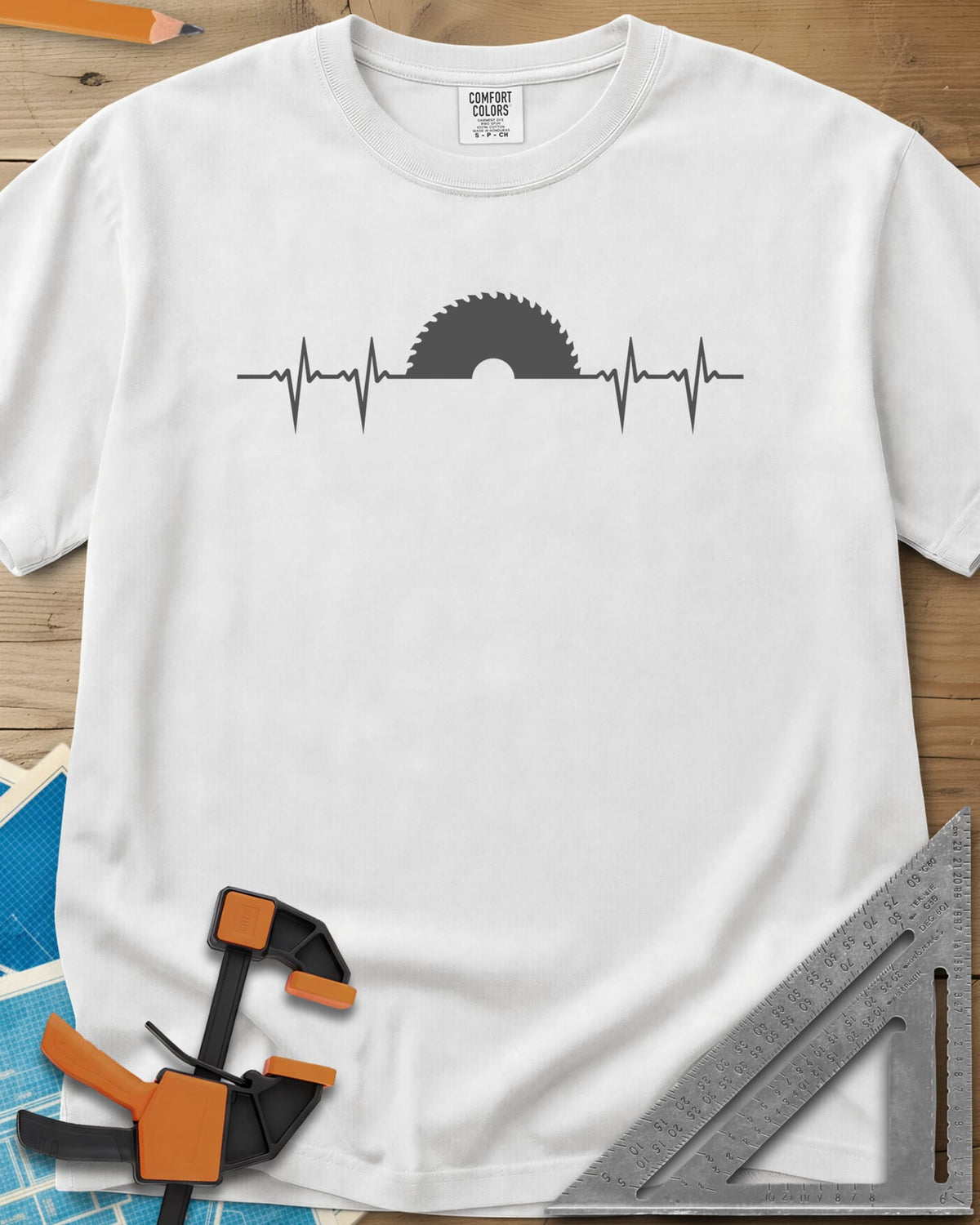 Woodworker Heartbeat heavyweight tee in White, a heartbeat line rising into a half saw blade