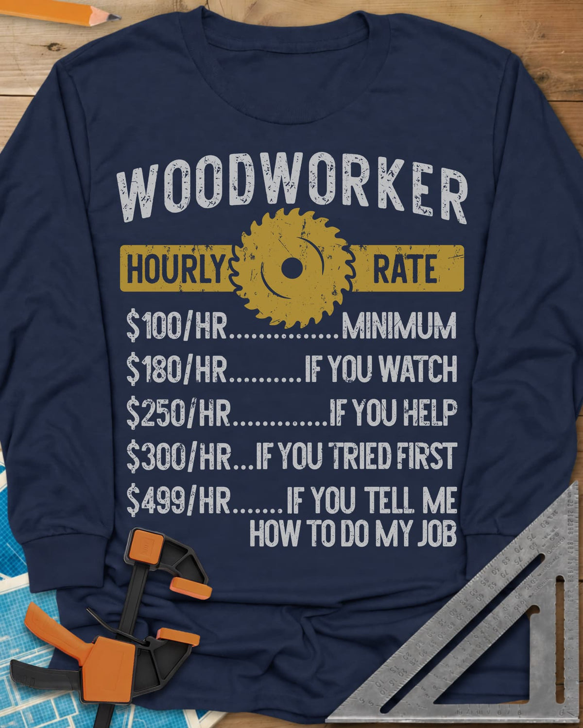 Woodworker Hourly Rate long sleeve shirt in Navy, a rate sheet with a gold saw blade banner and gag hourly tiers