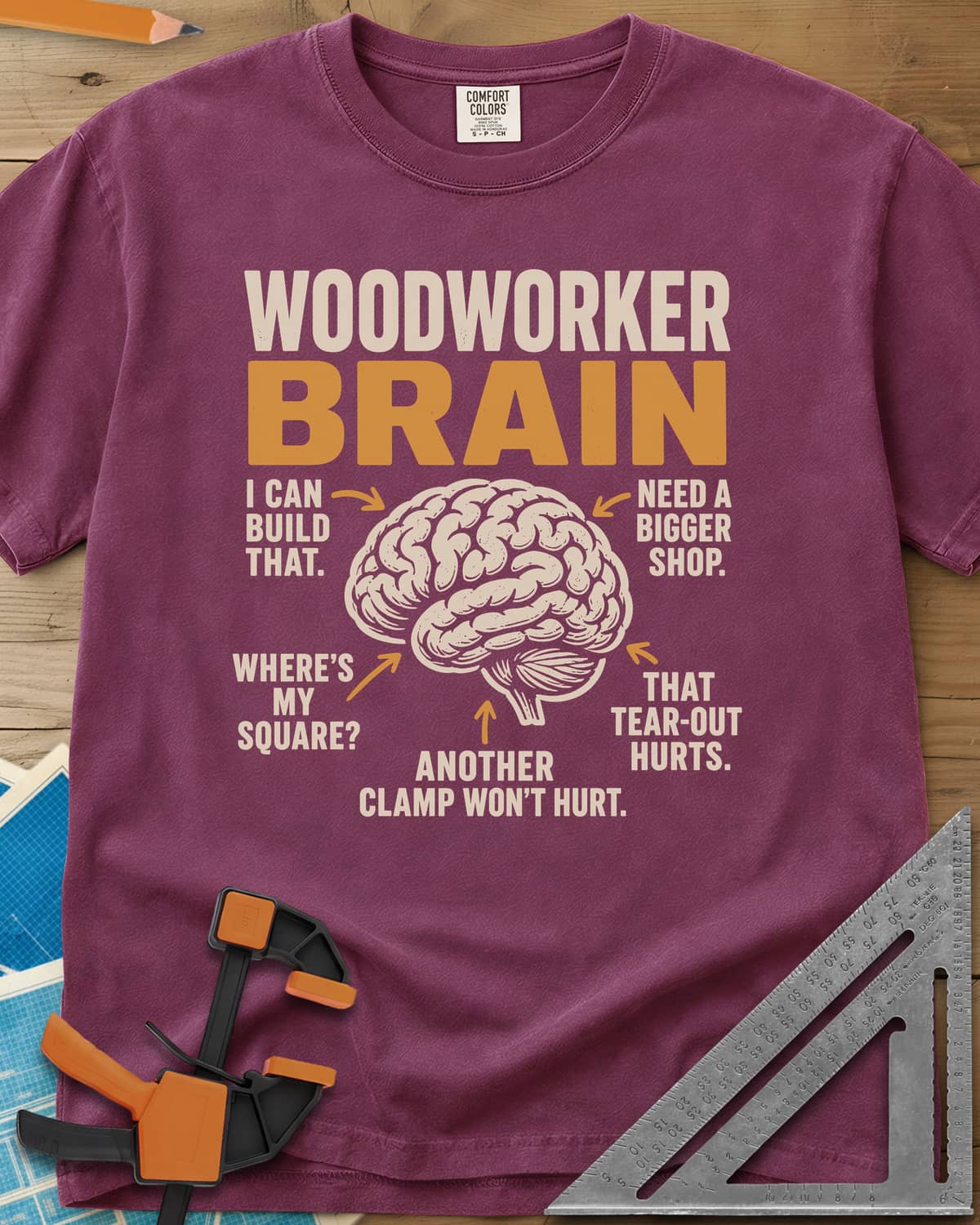 Woodworker's Brain heavyweight tee in Berry, a brain with arrows pointing to five shop thoughts