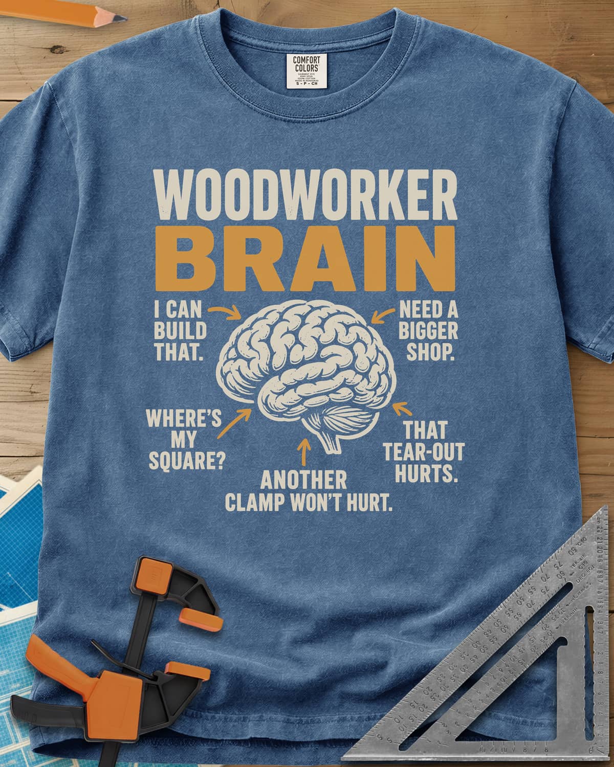 Woodworker's Brain heavyweight tee in Blue Jean, a brain with arrows pointing to five shop thoughts