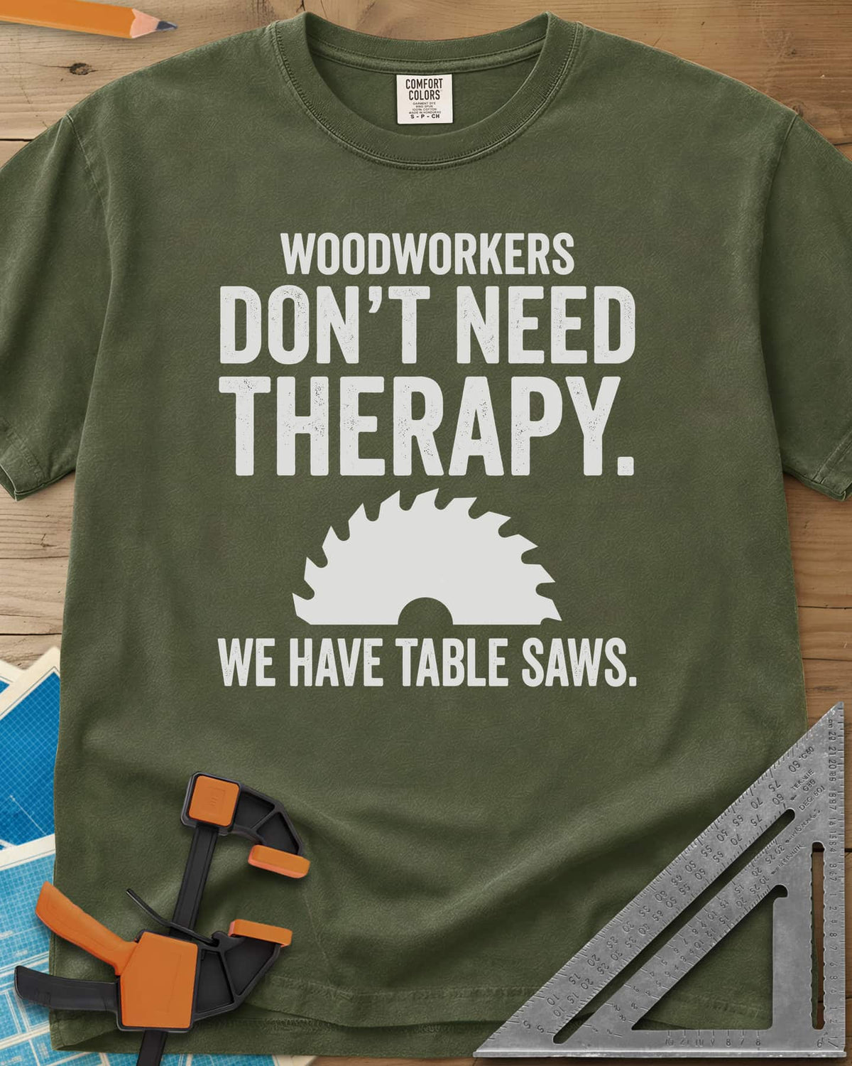 Woodworkers Have Table Saws heavyweight tee in Hemp, bold lettering above and below a round saw blade