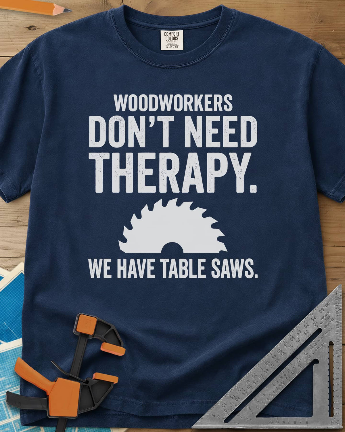 Woodworkers Have Table Saws heavyweight tee in Navy, bold lettering above and below a round saw blade