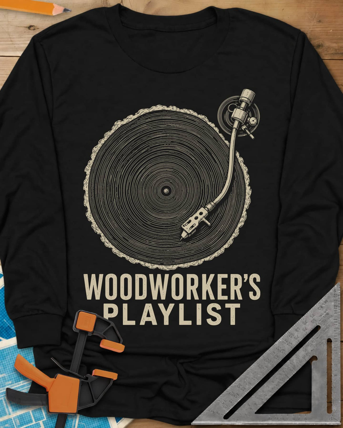 Woodworker’s Playlist long sleeve shirt in Black, tree-ring slice as a vinyl record with a turntable tonearm