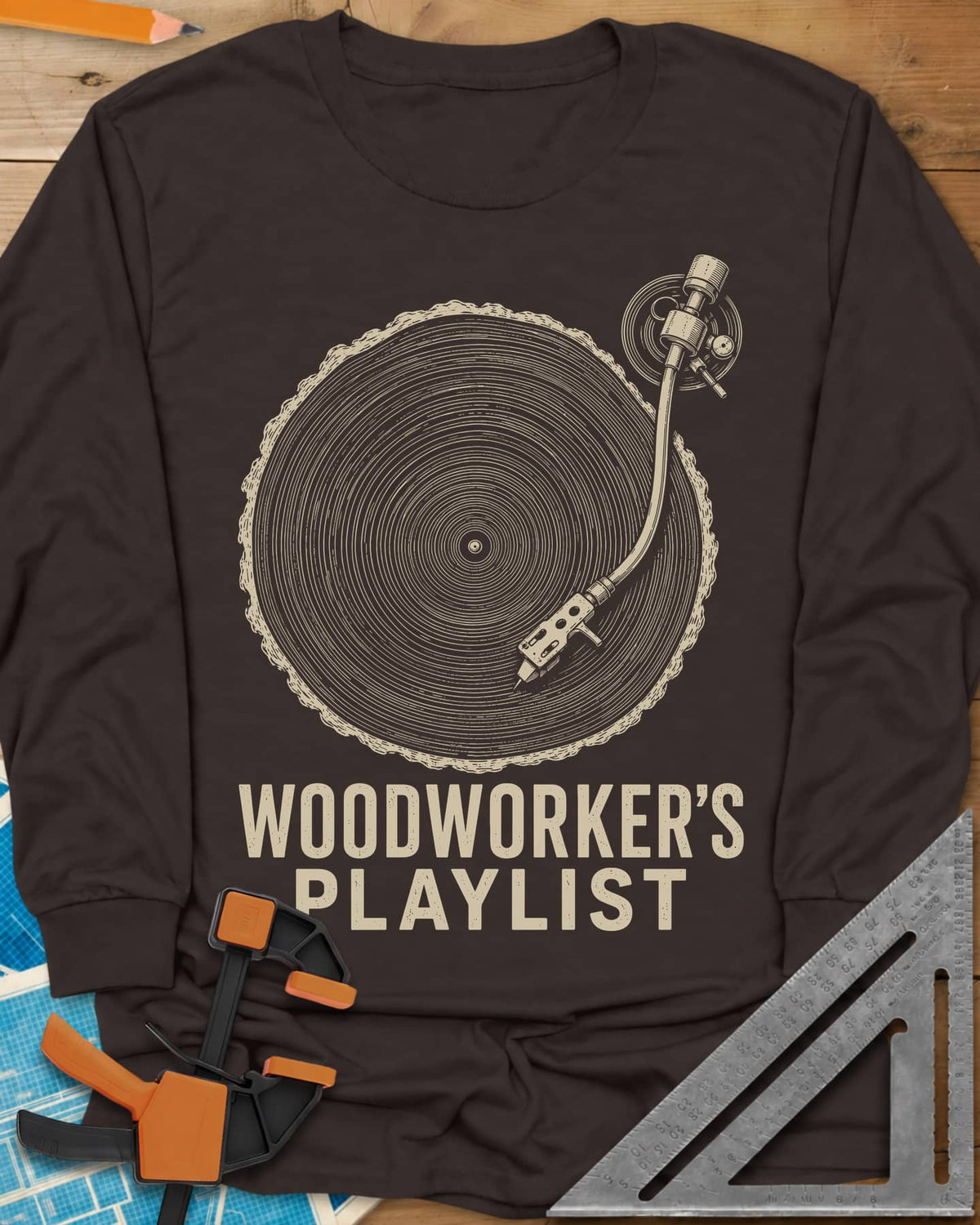 Woodworker’s Playlist long sleeve shirt in Dark Chocolate, tree-ring slice as a vinyl record with a turntable tonearm