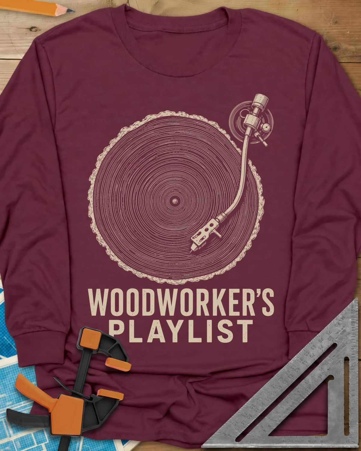 Woodworker’s Playlist long sleeve shirt in Maroon, tree-ring slice as a vinyl record with a turntable tonearm