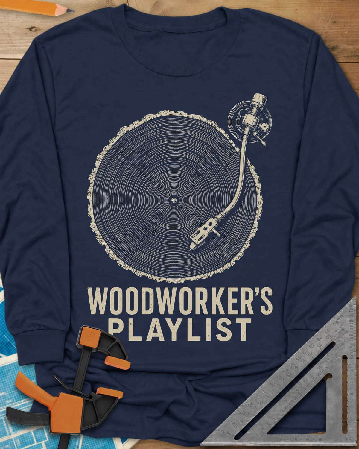 Woodworker’s Playlist long sleeve shirt in Navy, tree-ring slice as a vinyl record with a turntable tonearm