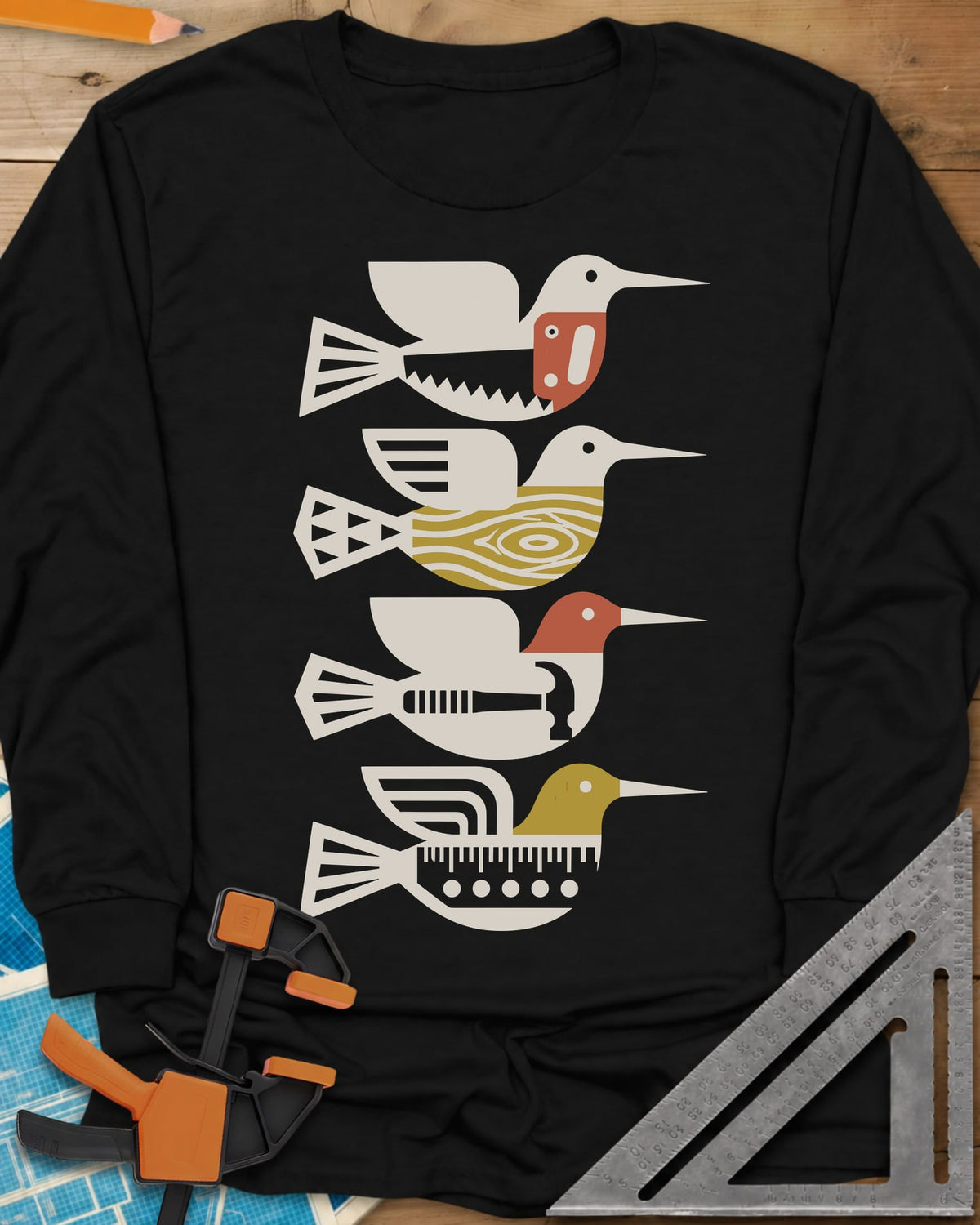 Woodworking Birds long sleeve shirt in Black, four stacked birds built from a saw, wood grain, hammer and ruler