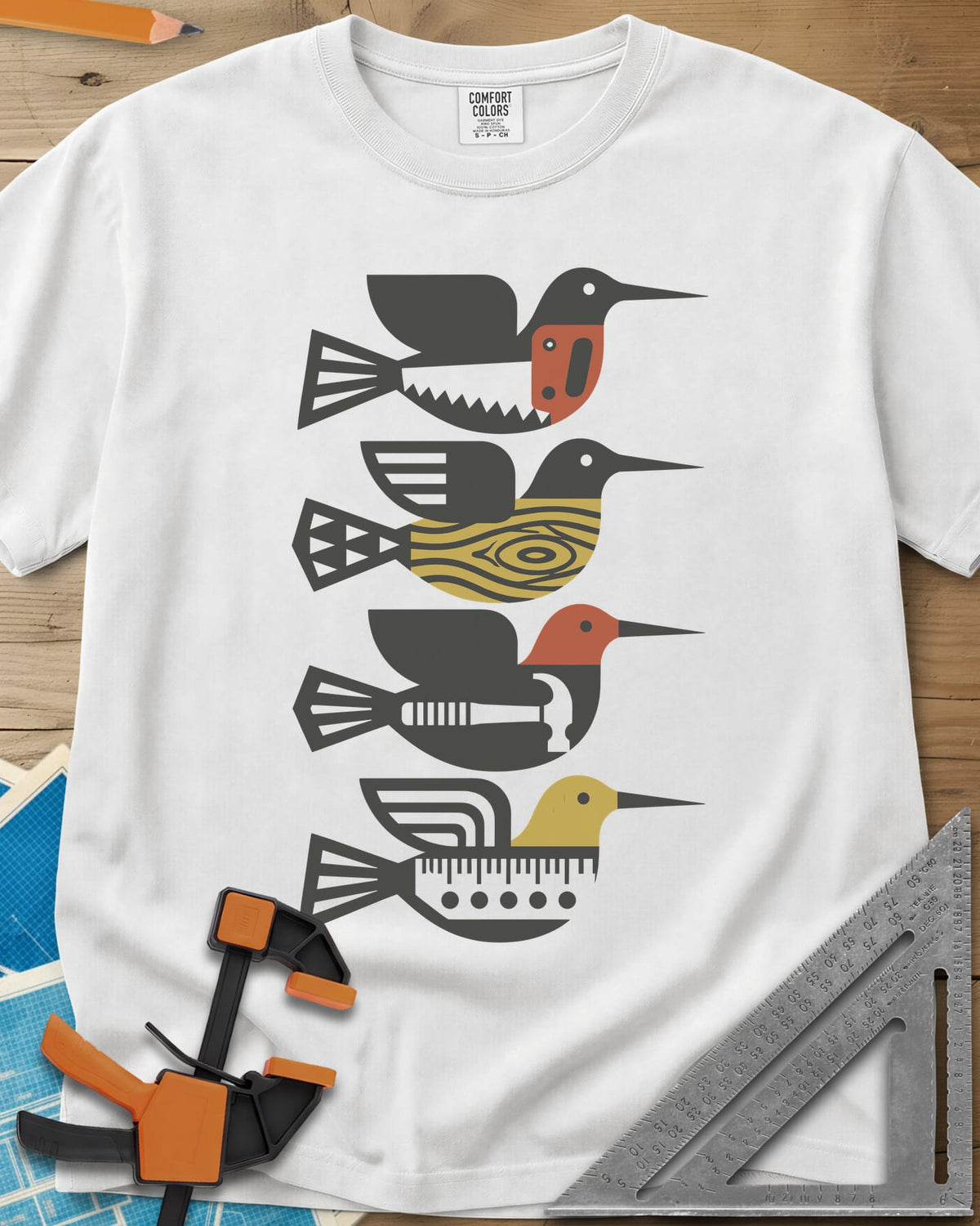 Woodworking Birds heavyweight tee in White, four stacked birds built from a saw, wood grain, hammer and ruler